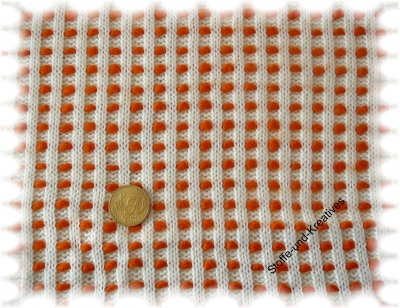 Pomponstrick  natur, ecru, orange _Stoffrest 49 cm reduziert